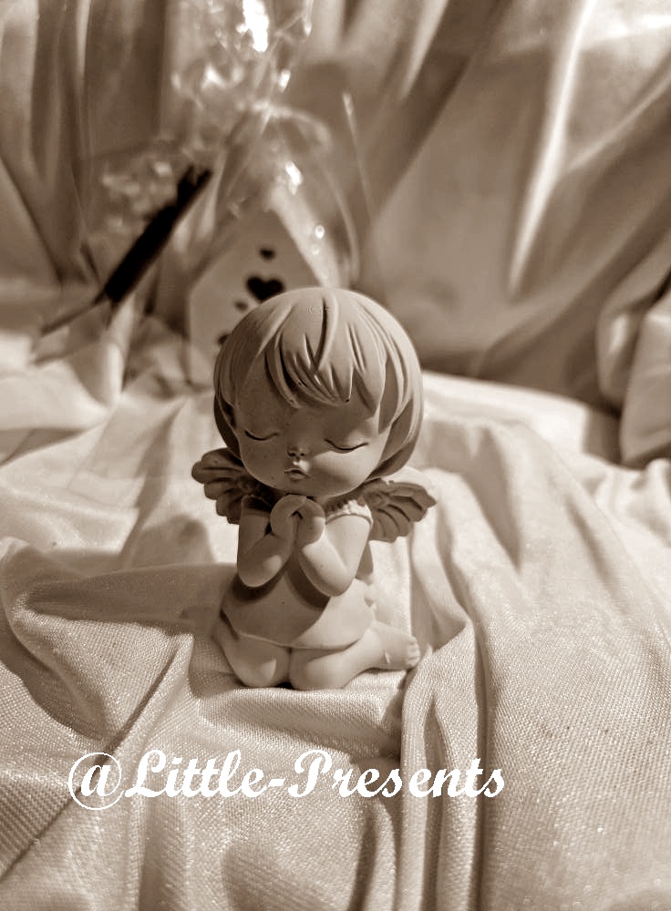 Keramik Engel – handgefertigte Figur mit Herz